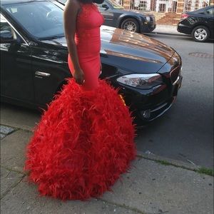 Show Stopper red prom dress.